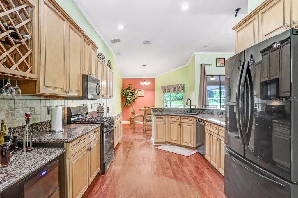 Refrigerator, Wood  Wood Cabinets and Granite Counter Tops