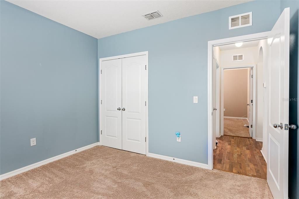 2nd Bedroom, High ceilings, spacious closet, freshly painted.