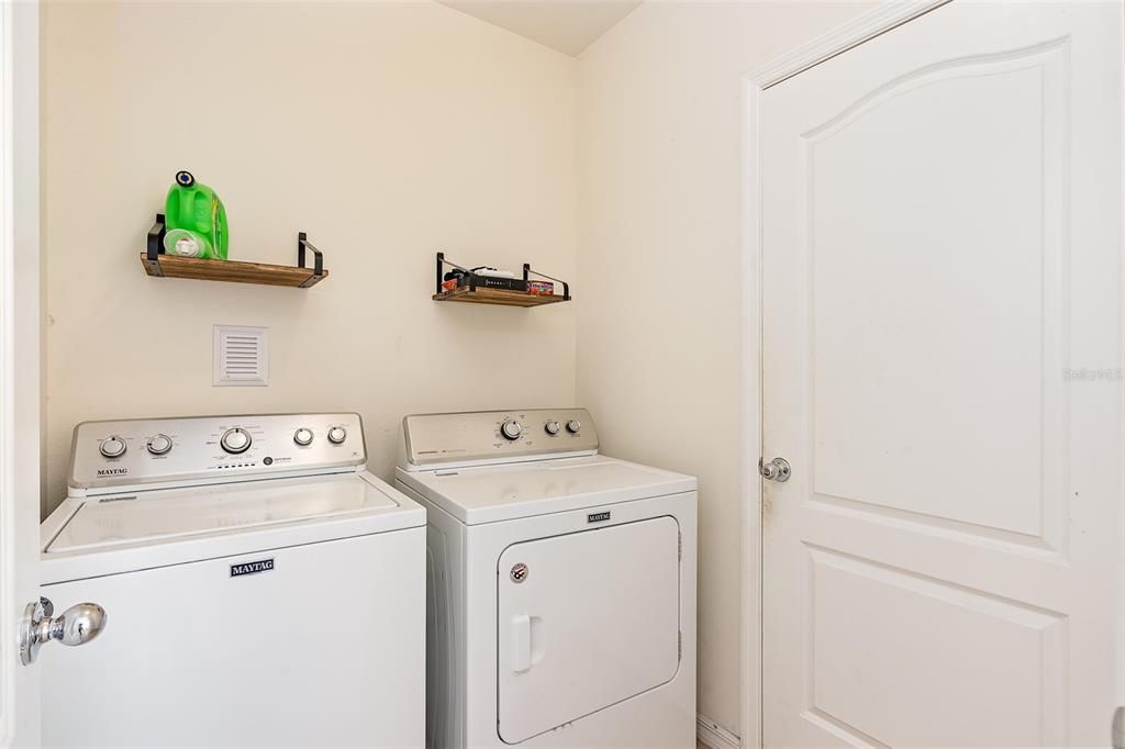 Laundry room just off of the Garage, Washer / Dryer do NOT convey.