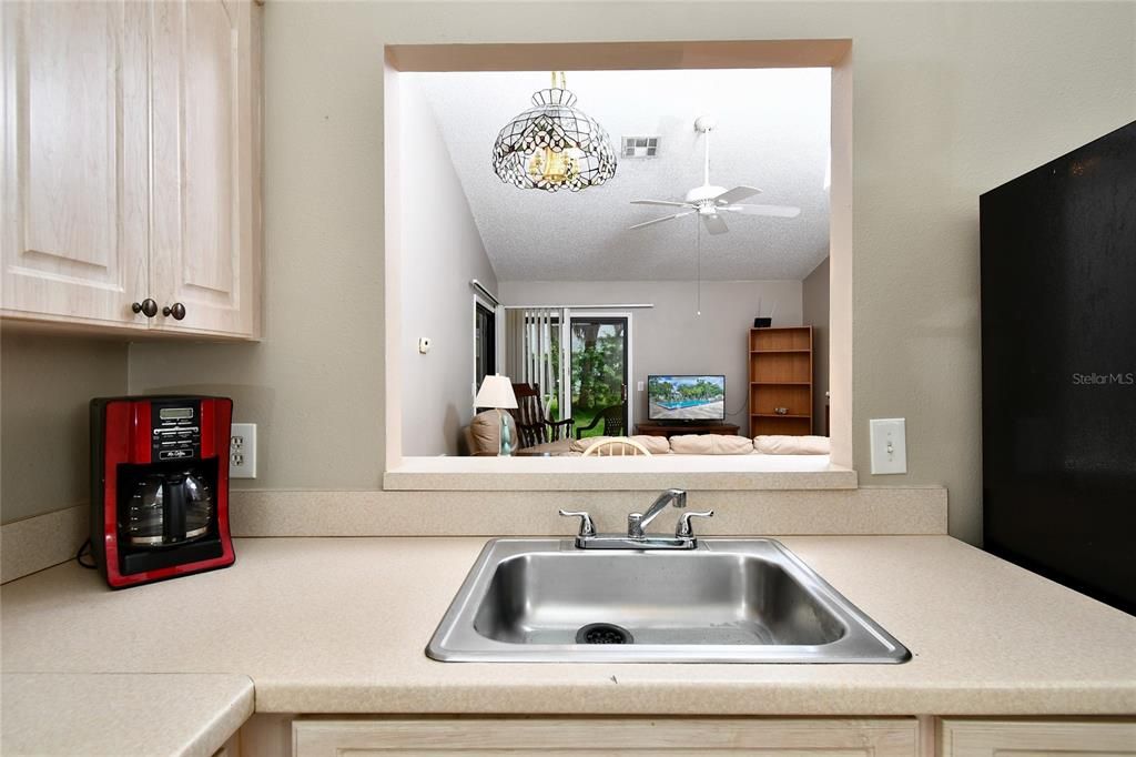Kitchen sink and window to dining area