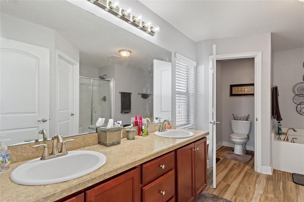 En-suite bathroom with dual sinks