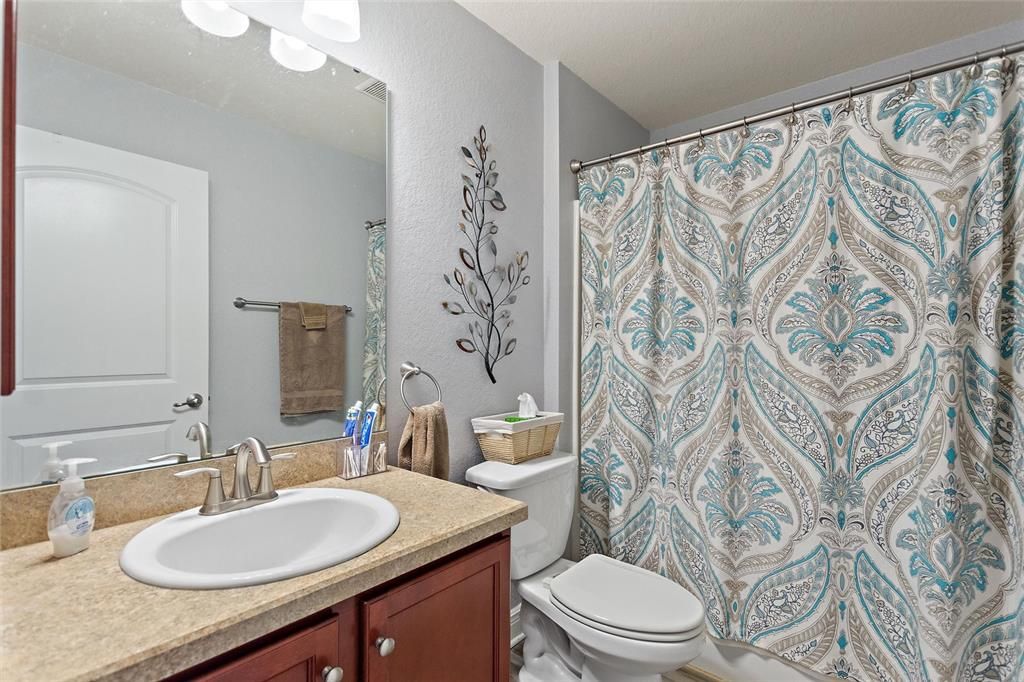 Main bathroom with shower tub