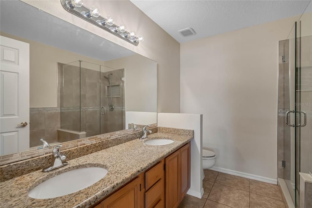 Hall Bathroom upstairs. Dual Sinks with a Shower and Separate Tub.