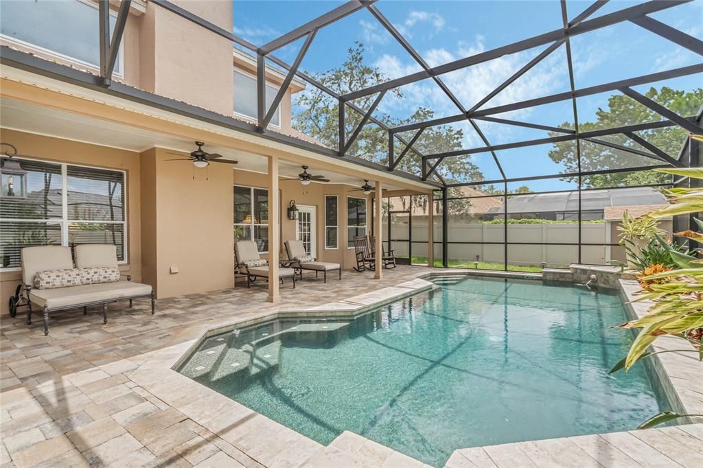 Notice the Pool Steps at both ends of the Pool. Chimney Cap on Fireplace was replaced in 2023.