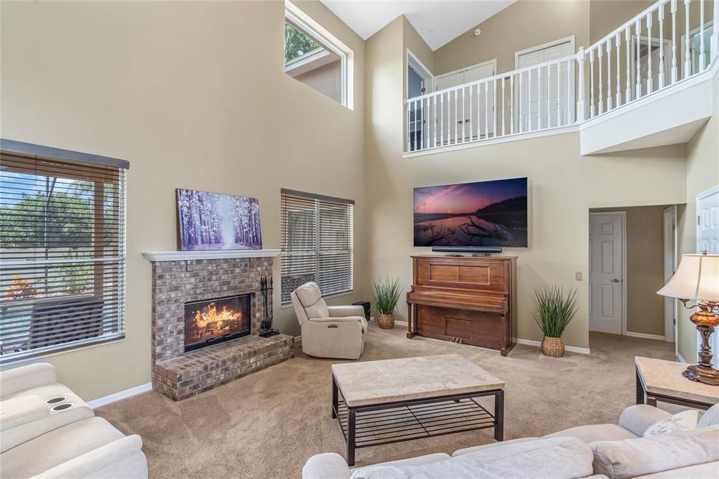 Additional view of Living Room overlooking the Pool through those large windows.