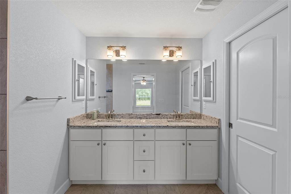 Master Bath with Pocket Door to Bedroom