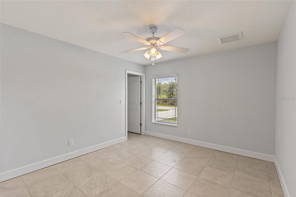 Guest Bedroom with Walk-in Closet