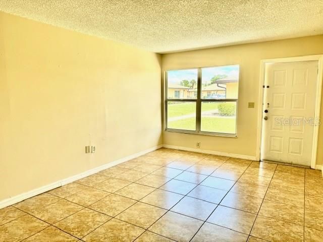 Large living room with l;ots of natural light.