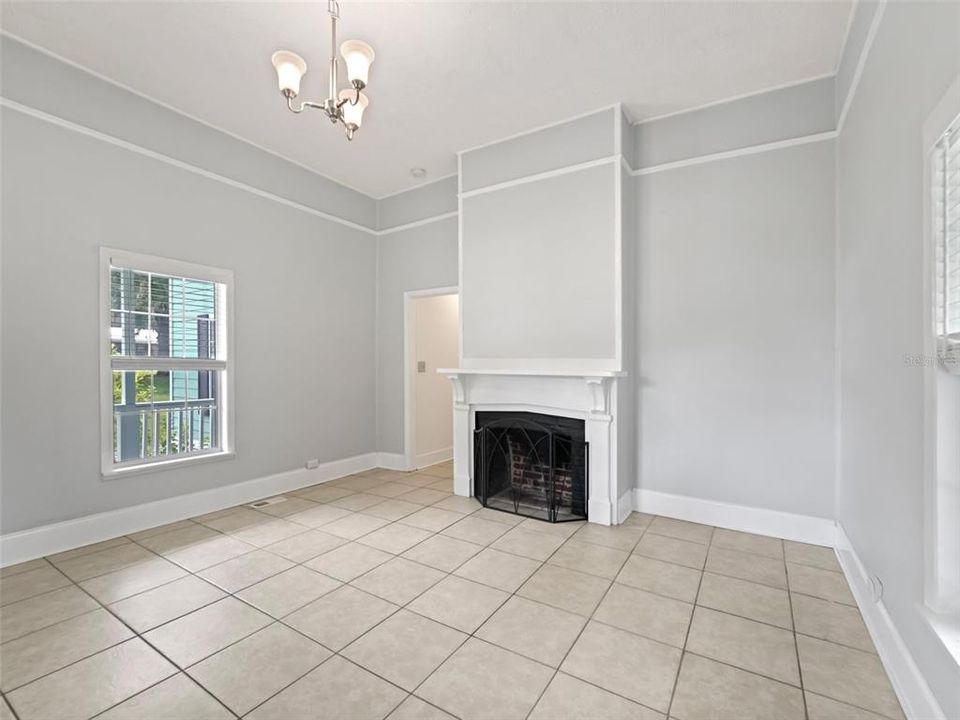 Living room looking from right corner. Note the molding and high ceiling.