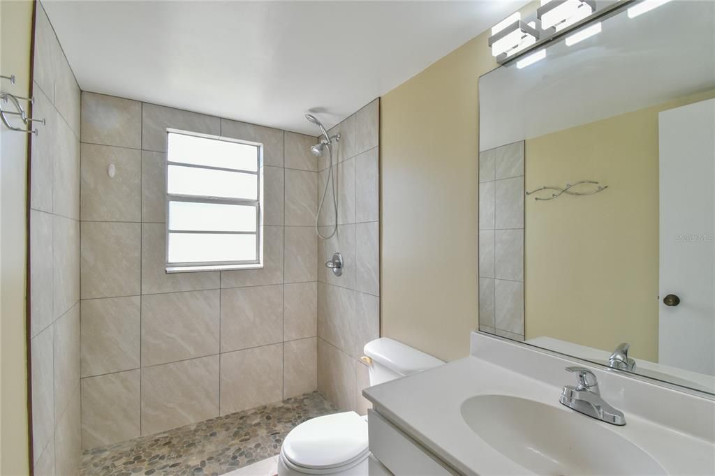 Bathroom w/large stand in shower