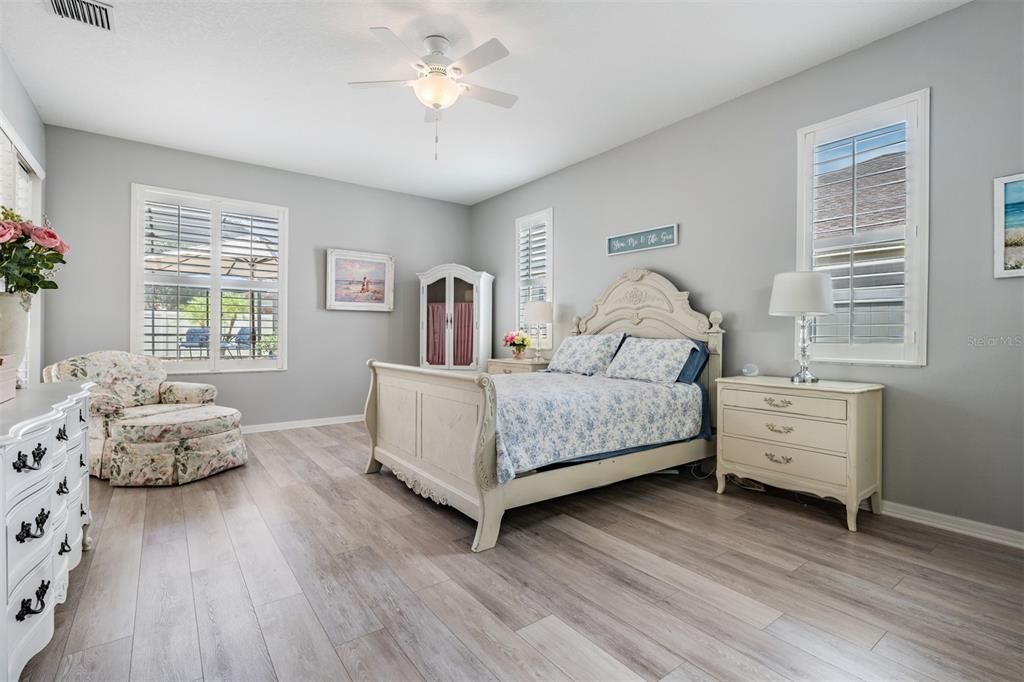 Large Master Bedroom, Ceiling Fan, Laminate Flooring and Plantation Shutters.