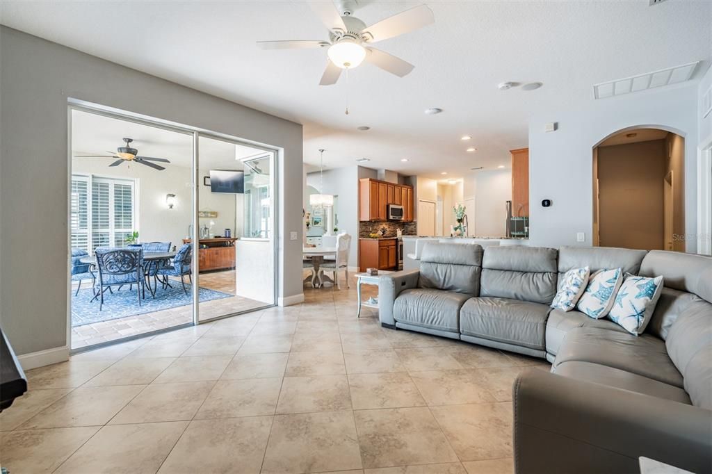 Spacious family room, ceiling fan, tile flooring and newly painted.