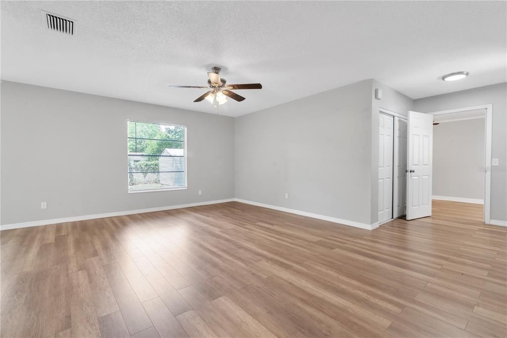 Living room and door to bonus room