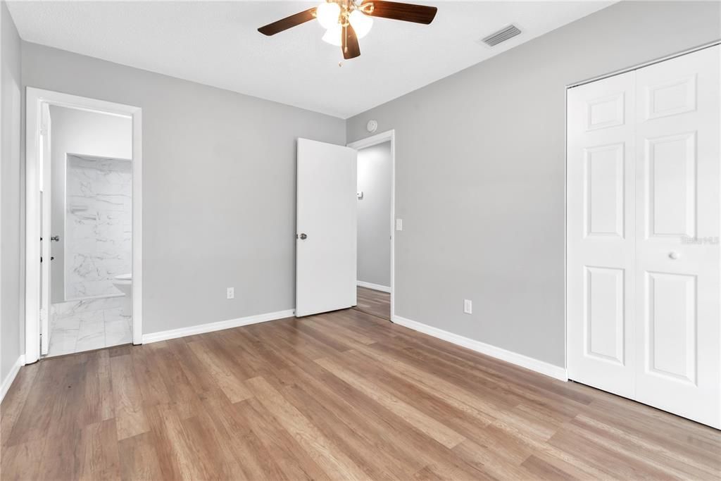 master bedroom and bathroom