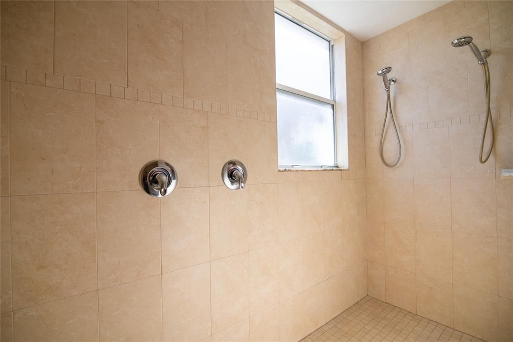 Partial picture of the large Master bathroom "L" shaped walk-in shower