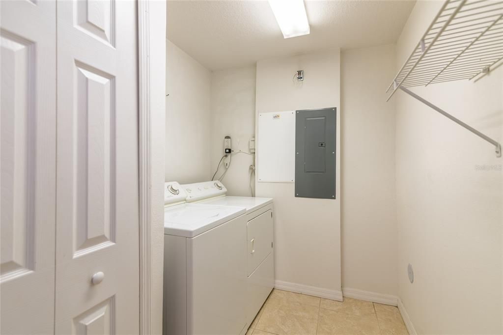 Inside laundry room with washer and dryer.