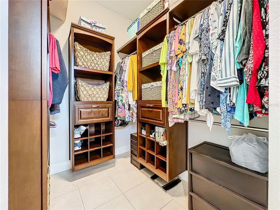 Primary bedroom custom closet.