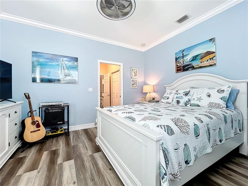 Anoher view of the guest bedroom and updated ceiling fan.