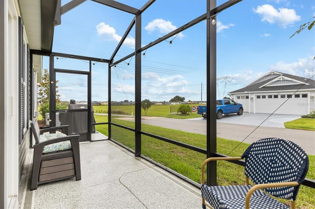 SCREENED PORCH WITH BIRDCAGE