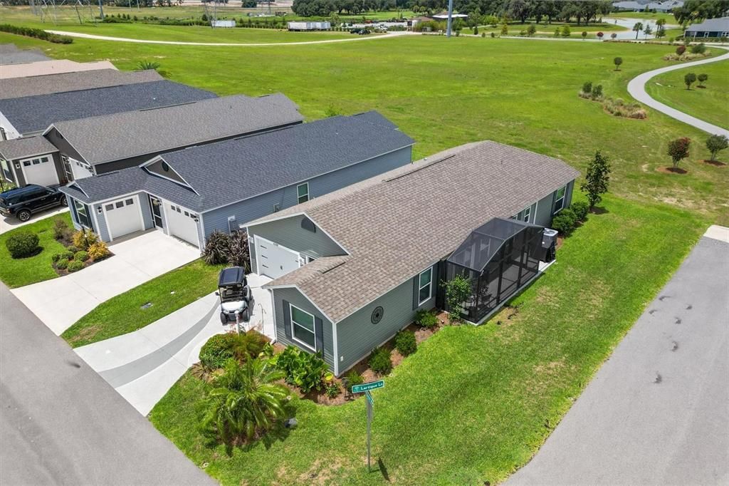 AERIAL VIEW OF HOME WITH WALKING BIKING TRAIL