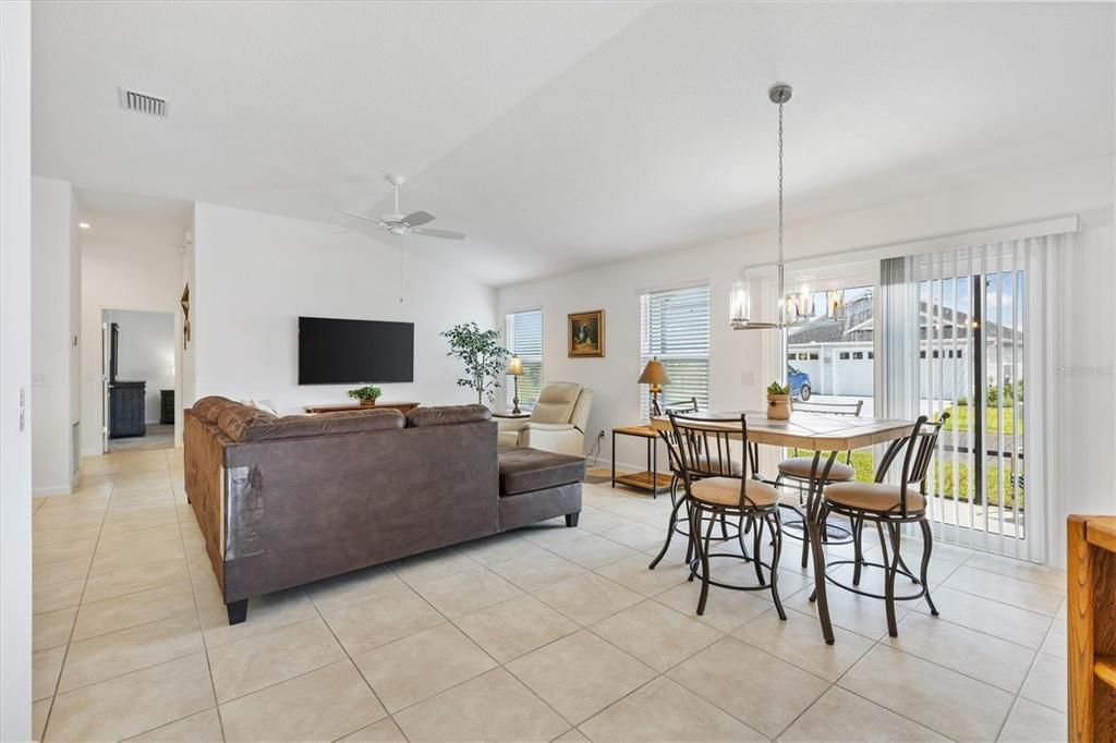 VIEW FROM FRONT ENTRY OF DINING ROOM AND LIVING ROOM