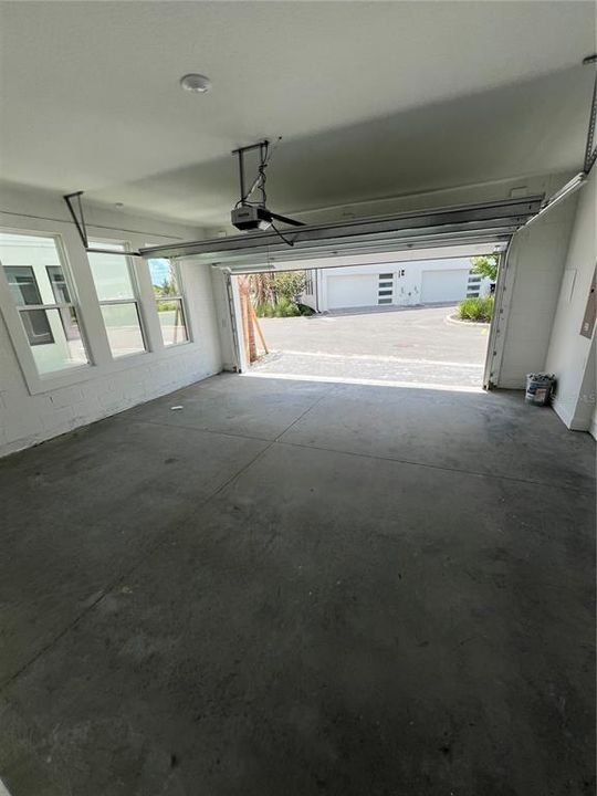 2 car garage with an additional storage closet