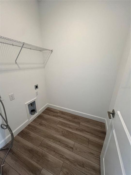 Third floor walk-in laundry room