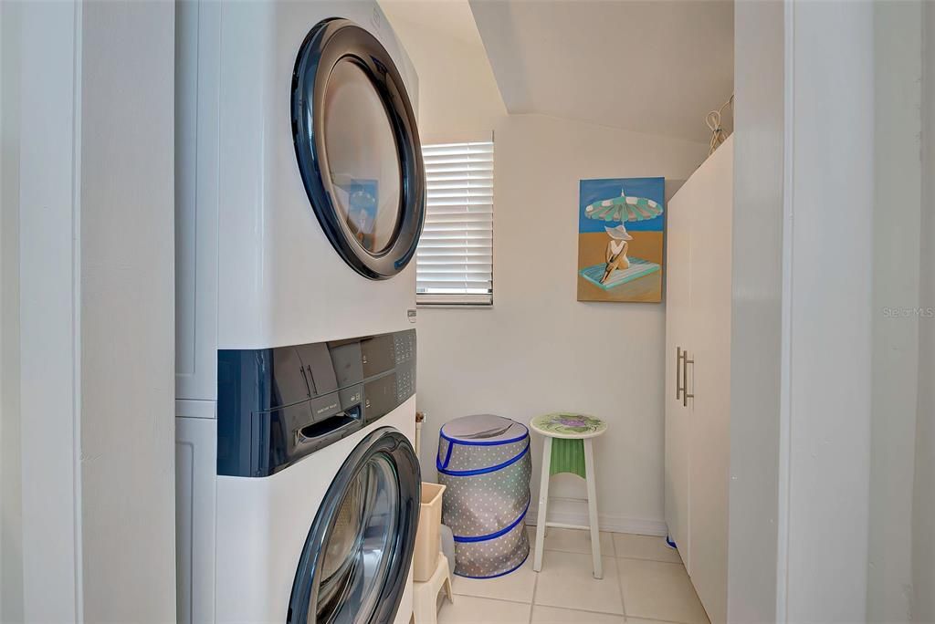 Utility Room—Full sized stack Washer/Dryer