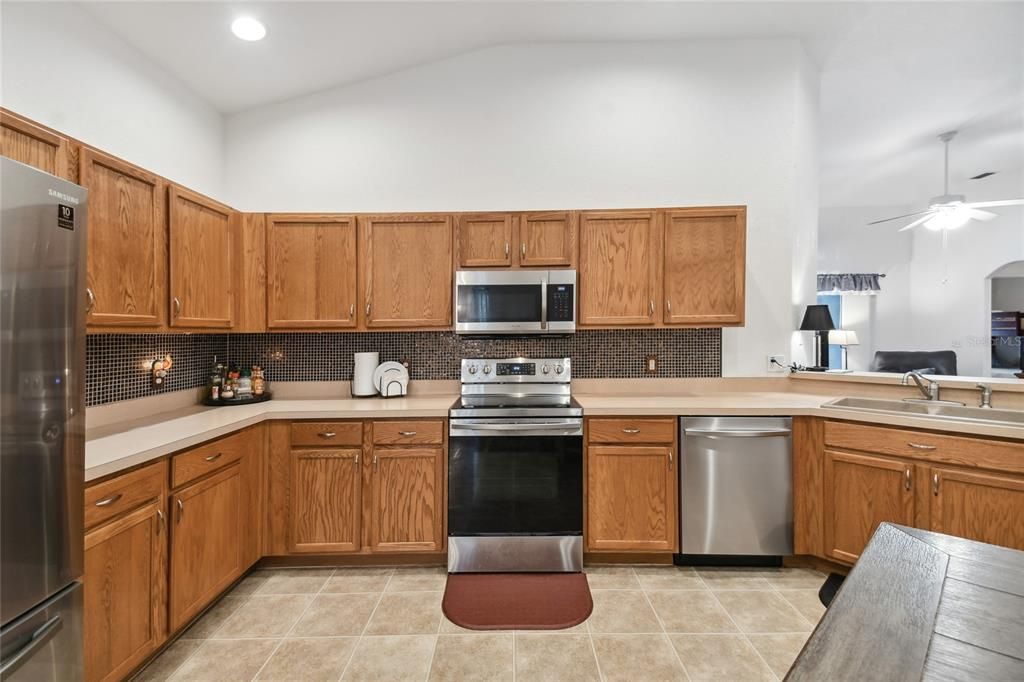 Kitchen has generous counter space and great storage.