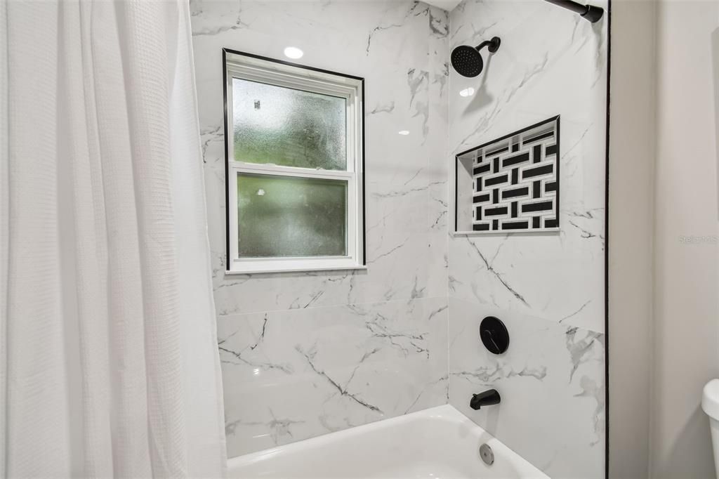 Shower/tub combo Guest Bathroom