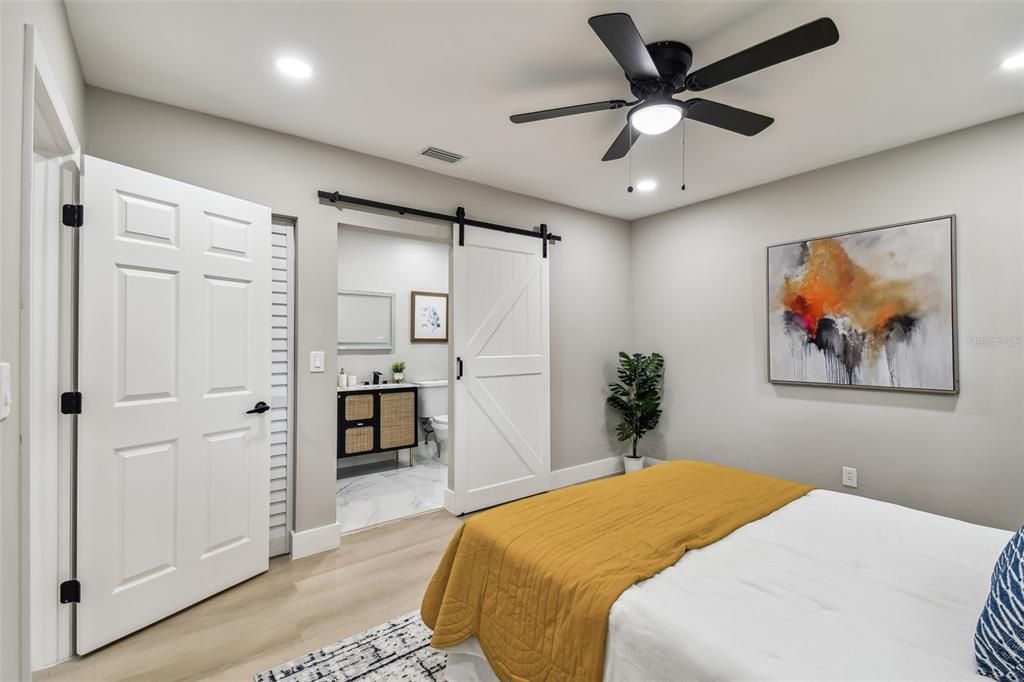 Barn door leading to owner's en suite