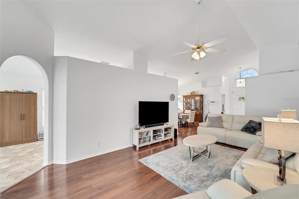 view of the living room from the primary bedroom which is at the back of the home