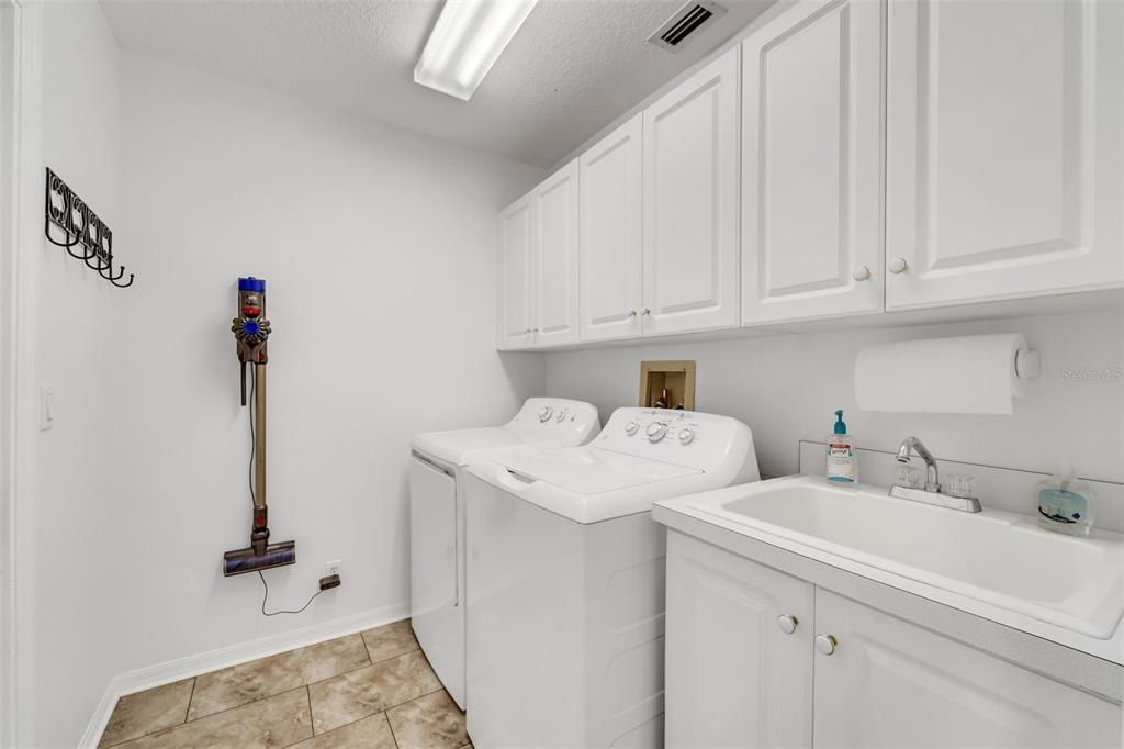 laundry room just off the front entryway (leads to the garage)