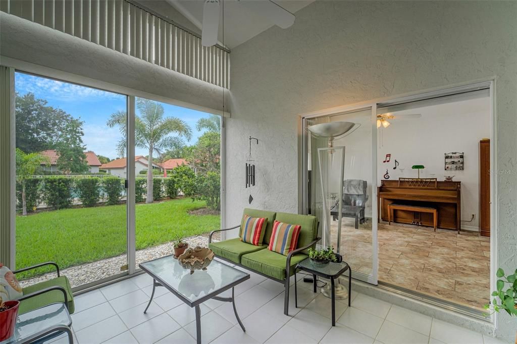 air conditioned lanai with family room in the background