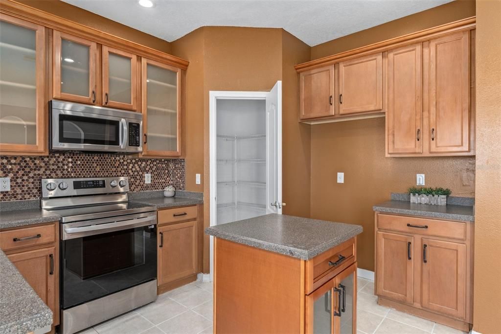 There is a large pantry in the kitchen. The buyer will receive a $1700 allowance at closing