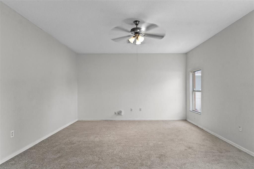 The family room is very spacious with brand new carpet