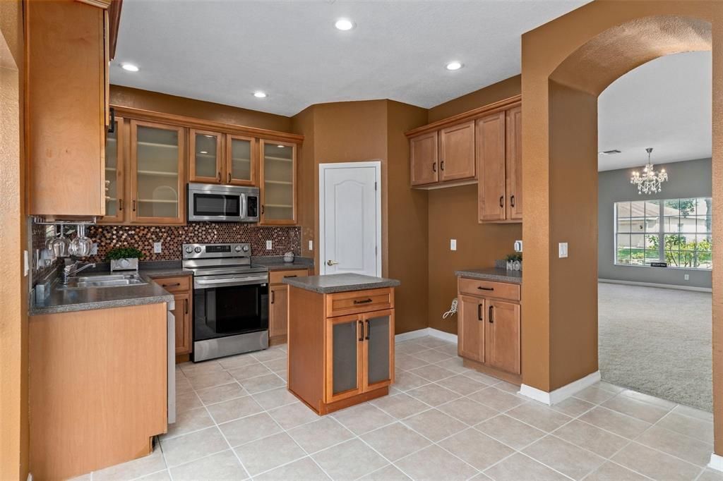 Notice the Gorgeous kitchen cabinets
