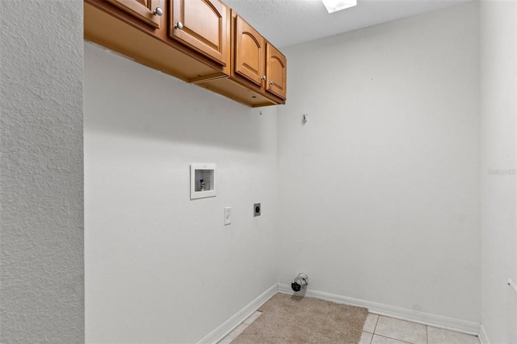 Laundry Room with cabinets