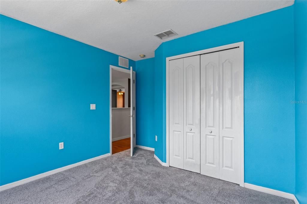 This bedroom has a large closet