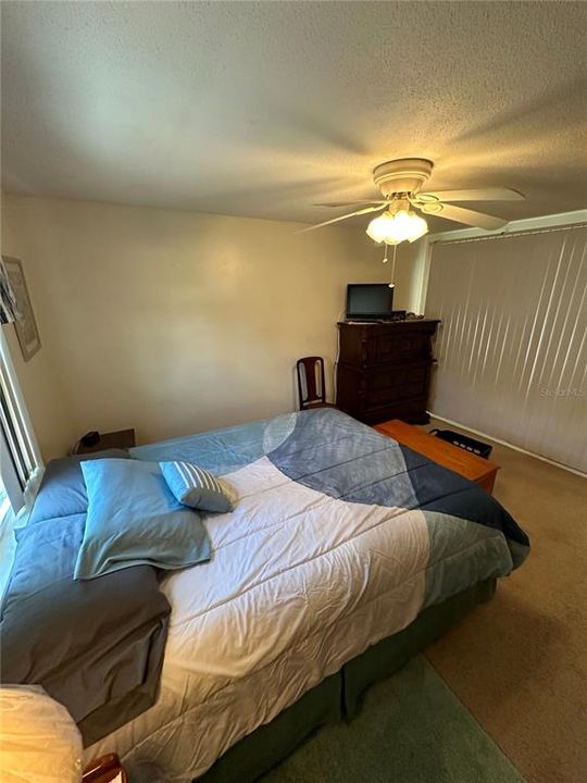 Primary Bedroom with a queen bed and Smart TV for all your steaming needs.