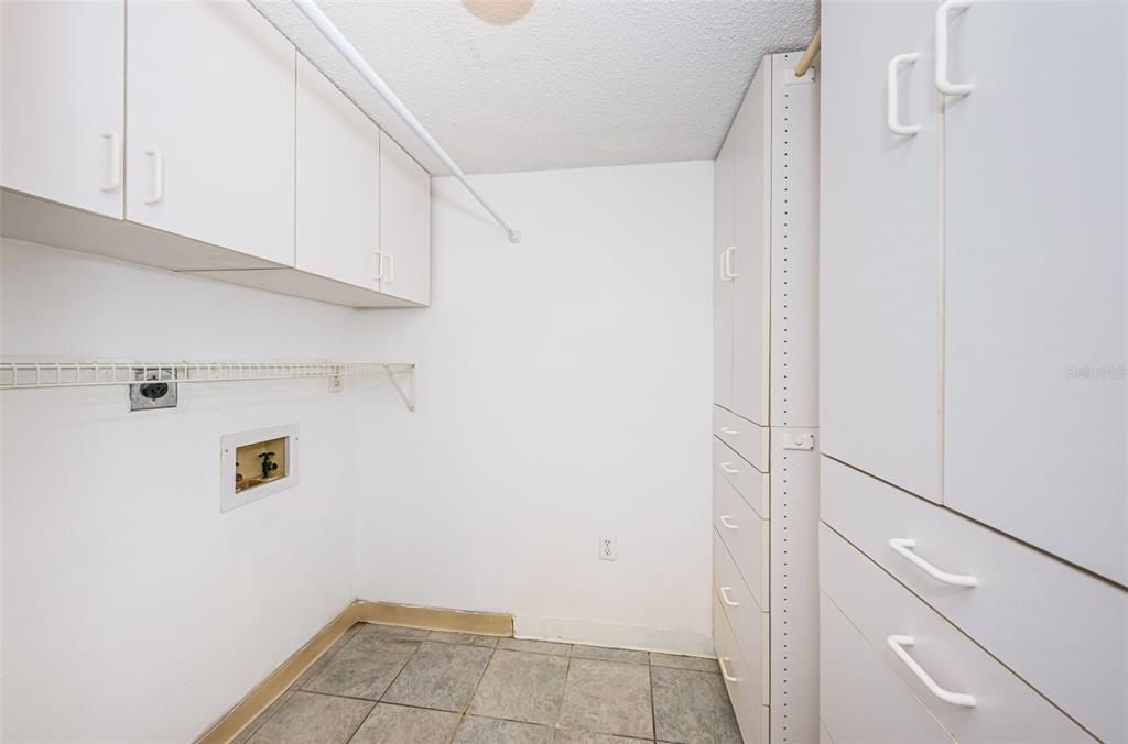 Primary bedroom w/view toward bathroom and walk-in closet