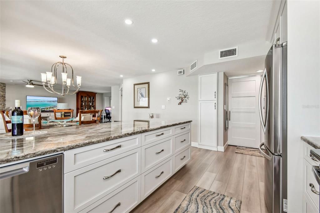 Three sets of deep drawers and an appliance pantry for kitchen