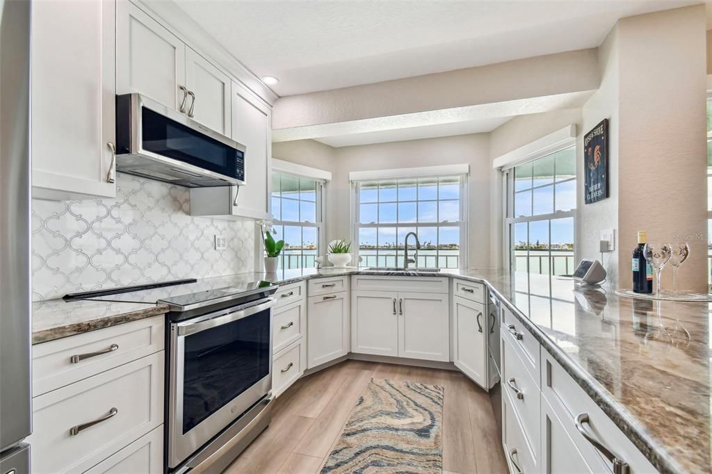 Extra cabinets & drawers in this custom kitchen