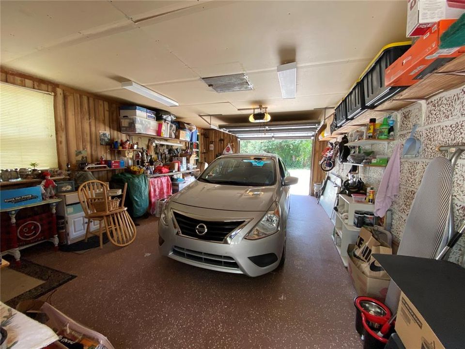 Garage with tons of extra storage space.