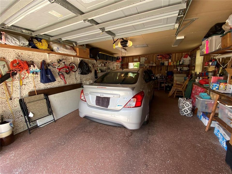 Garage with tons of extra storage space.