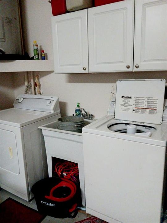 Washer dryer utility sink and extra freezer remain