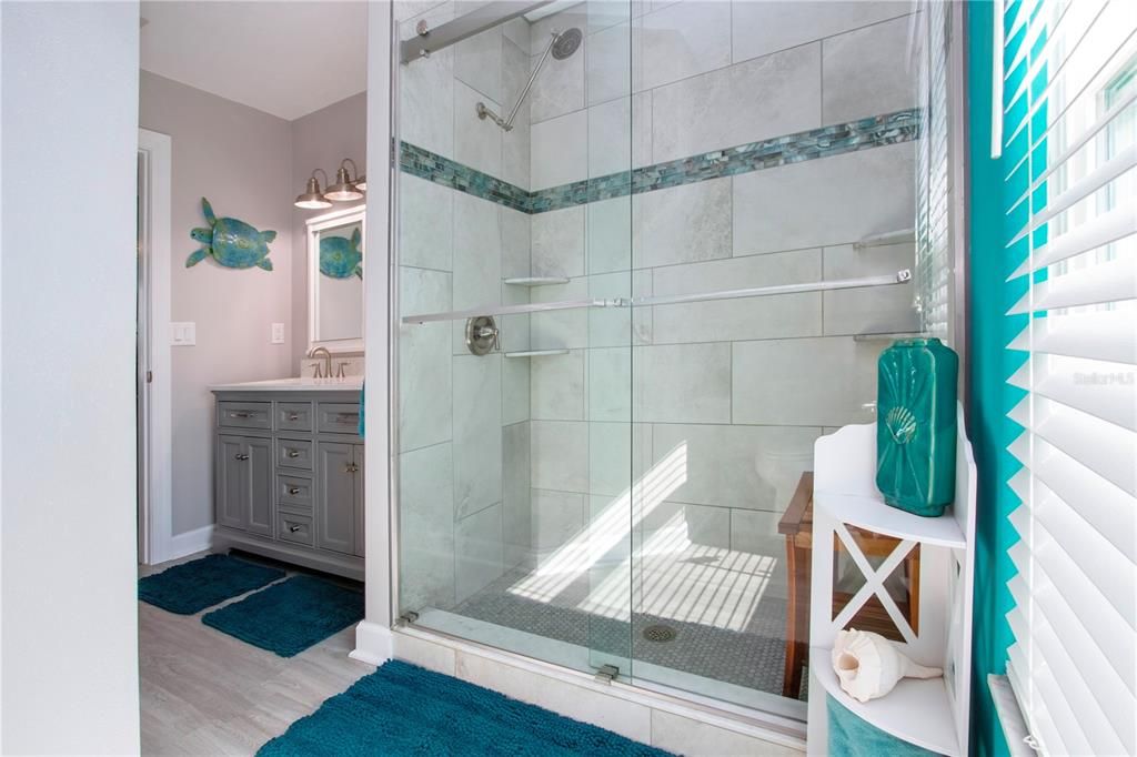 En-Suite Bathroom With Tile Walk-In Shower