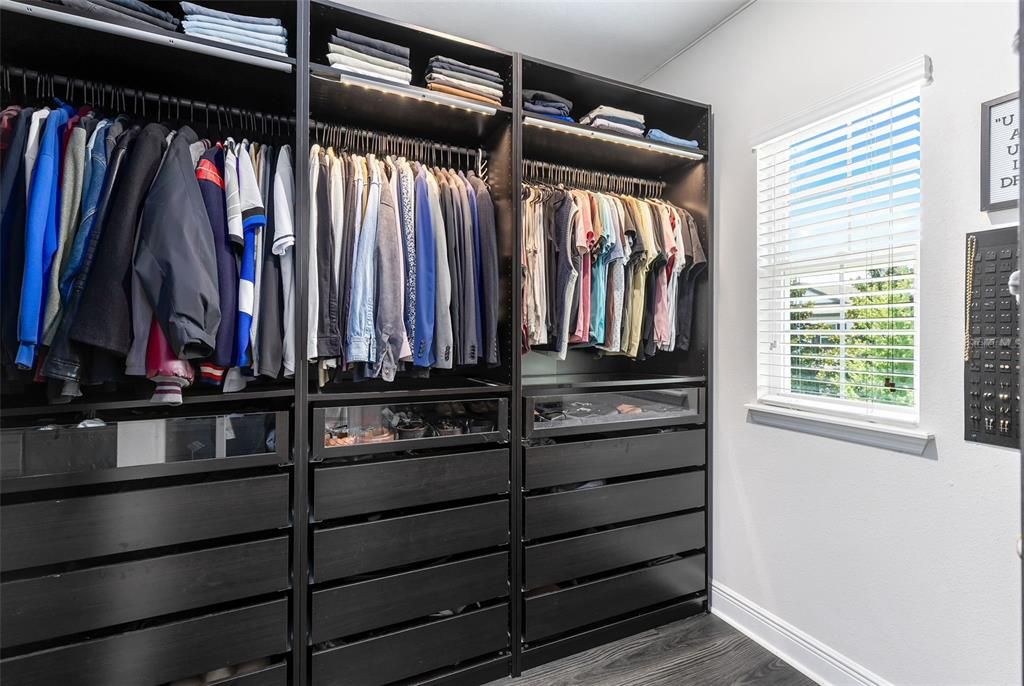 You'll love the ample sized walk-in closet with built-in drawers and shelves.