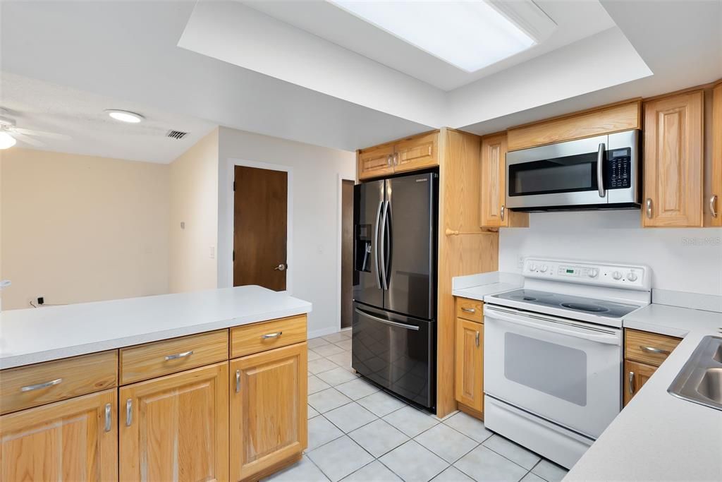 Featuring newer cabinets, along with a newer refrigerator, and dishwasher.