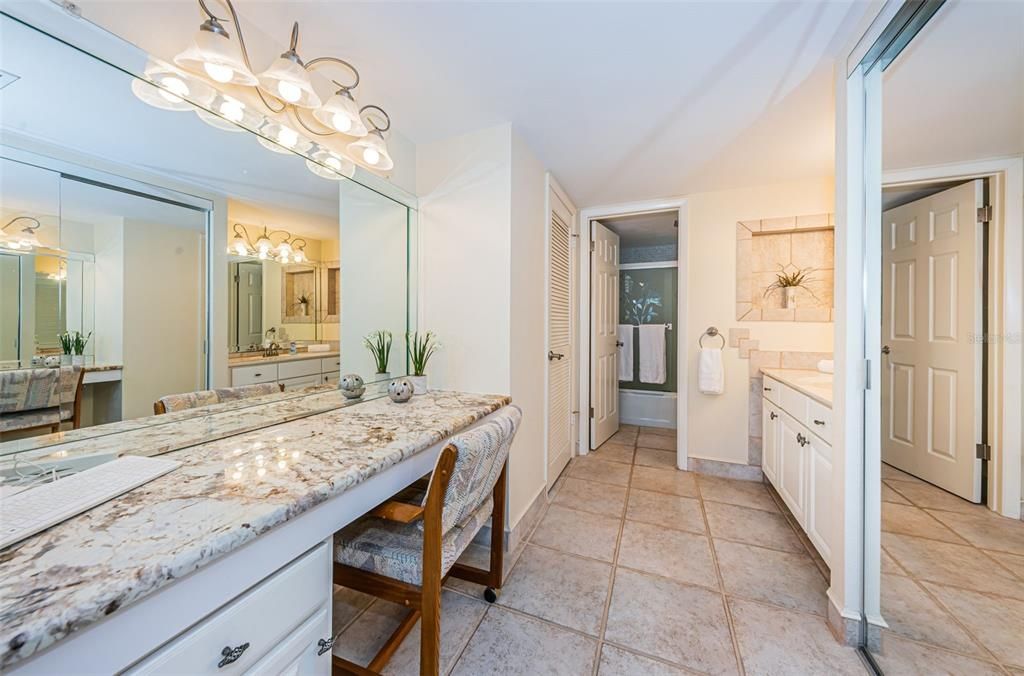 Light & Bright Master Suite Features Dual Vanities, Walk in Closet & Dress Area